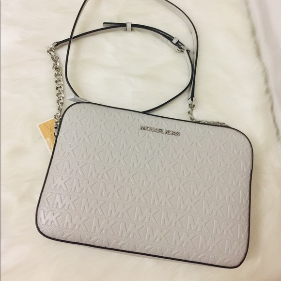 Michael Kors debossed leather Crossbody bag - Picture 8 of 11